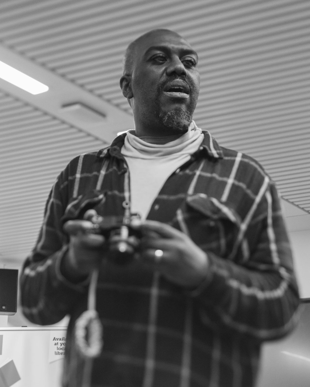Clovis Lowe with a camera.